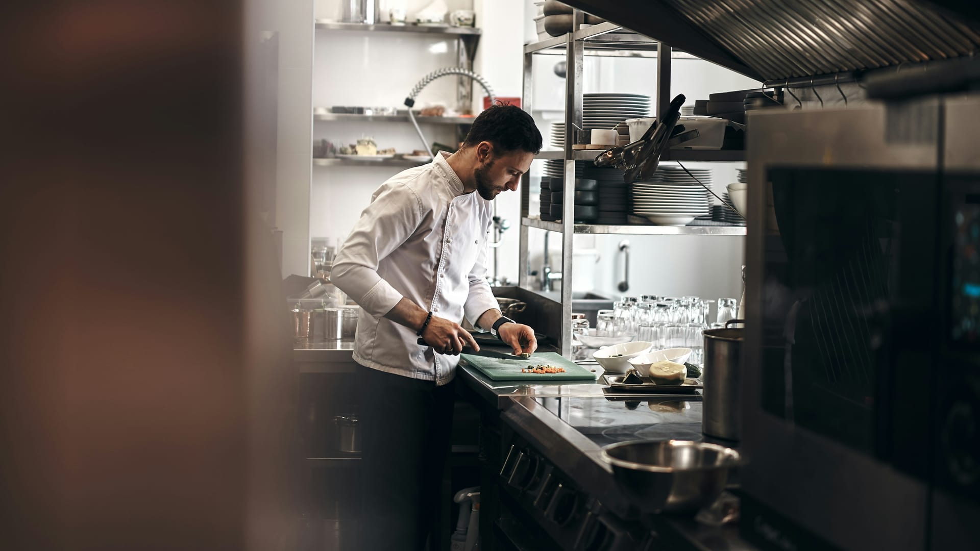 A professional kitchen with clean stainless steel surfaces